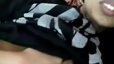 Young Indian woman with big sex eyes flashes her XXX tits in bed